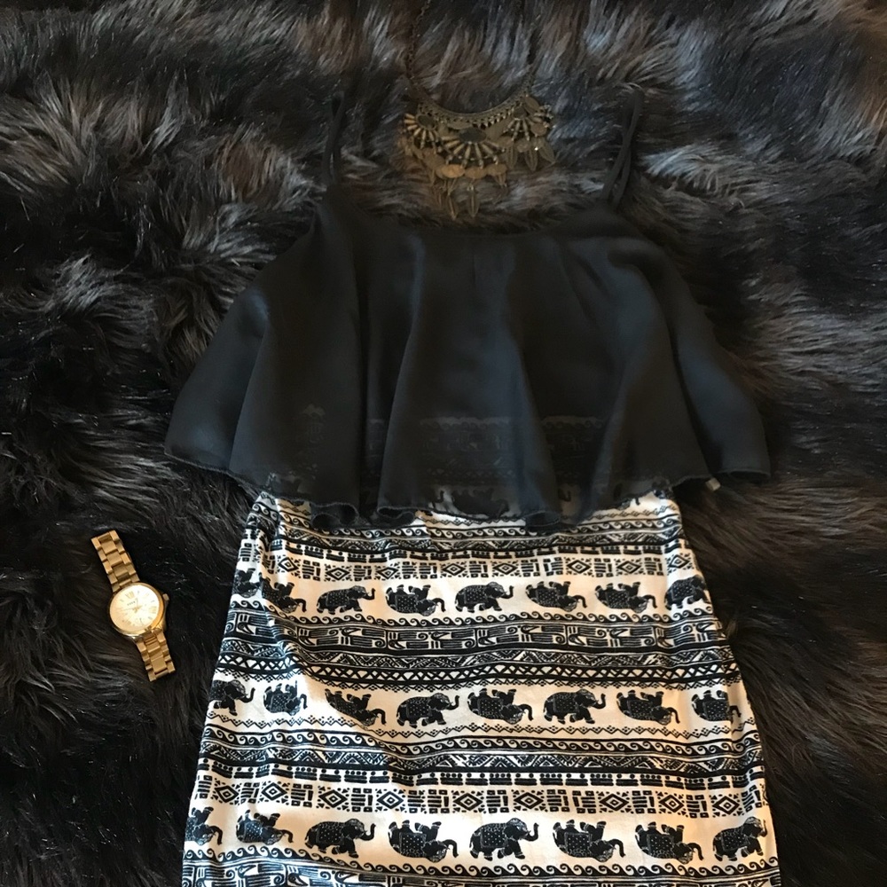 Tribal print bodycon mini dress with ruffle bust